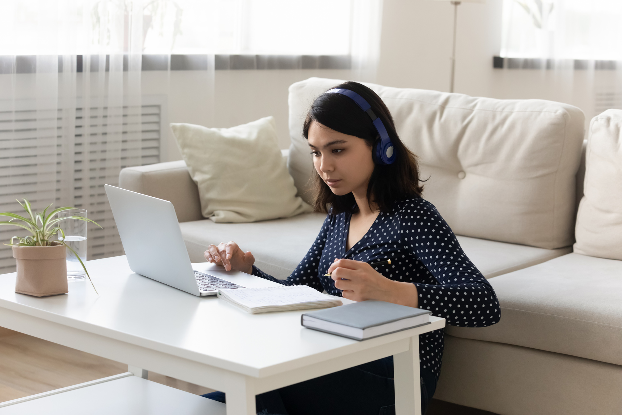 Attentive young vietnamese lady study language at distant online course